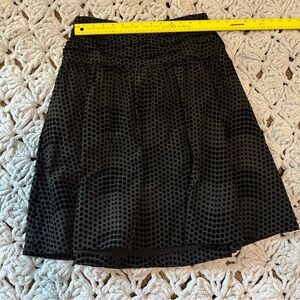Anthropologie Black Knee-Length Smocked A-Line Skirt